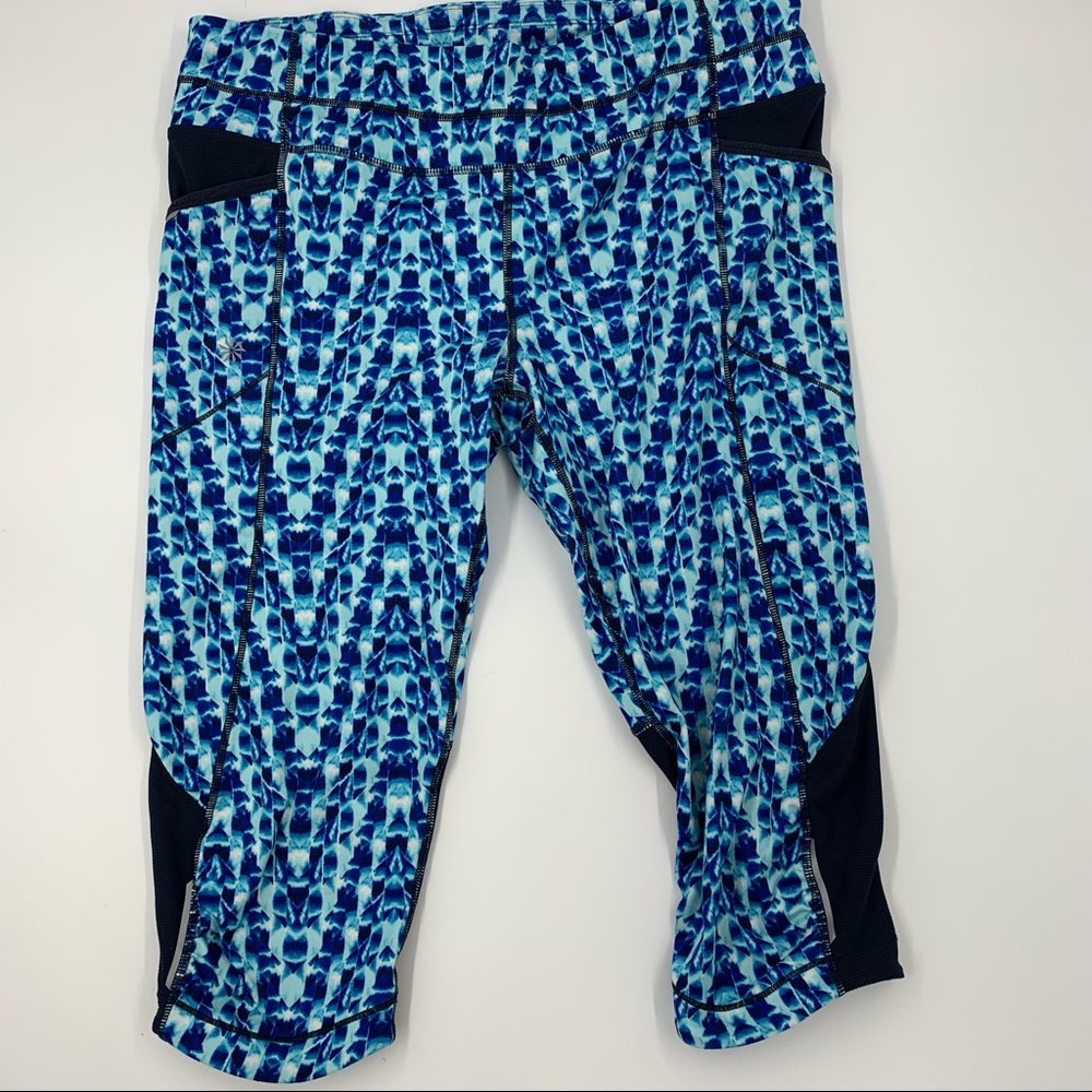 Athleta Cropped Leggings with Mesh and side pockets, Size Large